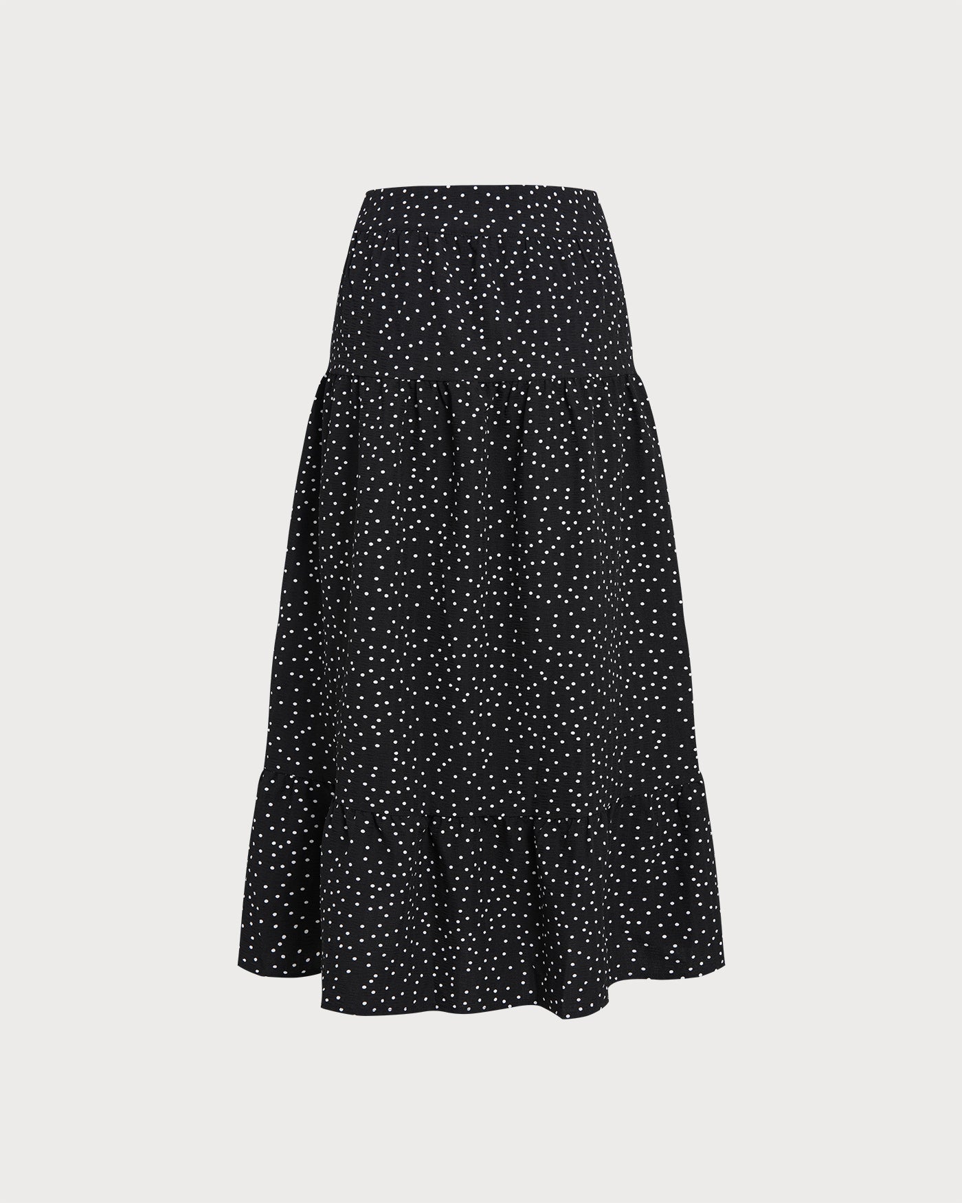 Falda midi fruncida negra de lunares