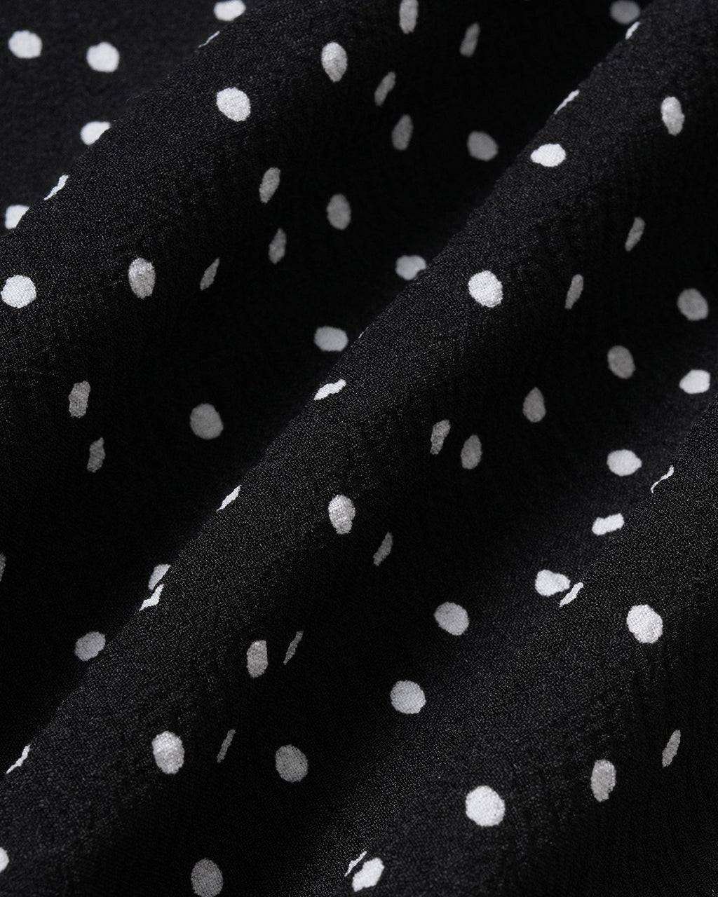 Falda midi fruncida negra de lunares