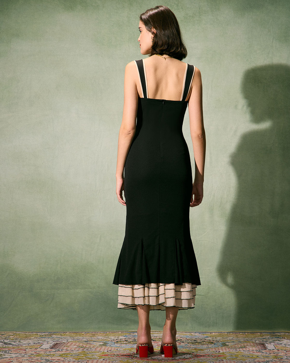 El vestido maxi ajustado con escote corazón negro