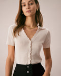 Camiseta de punto pointelle con cuello de pico y botones en color nude