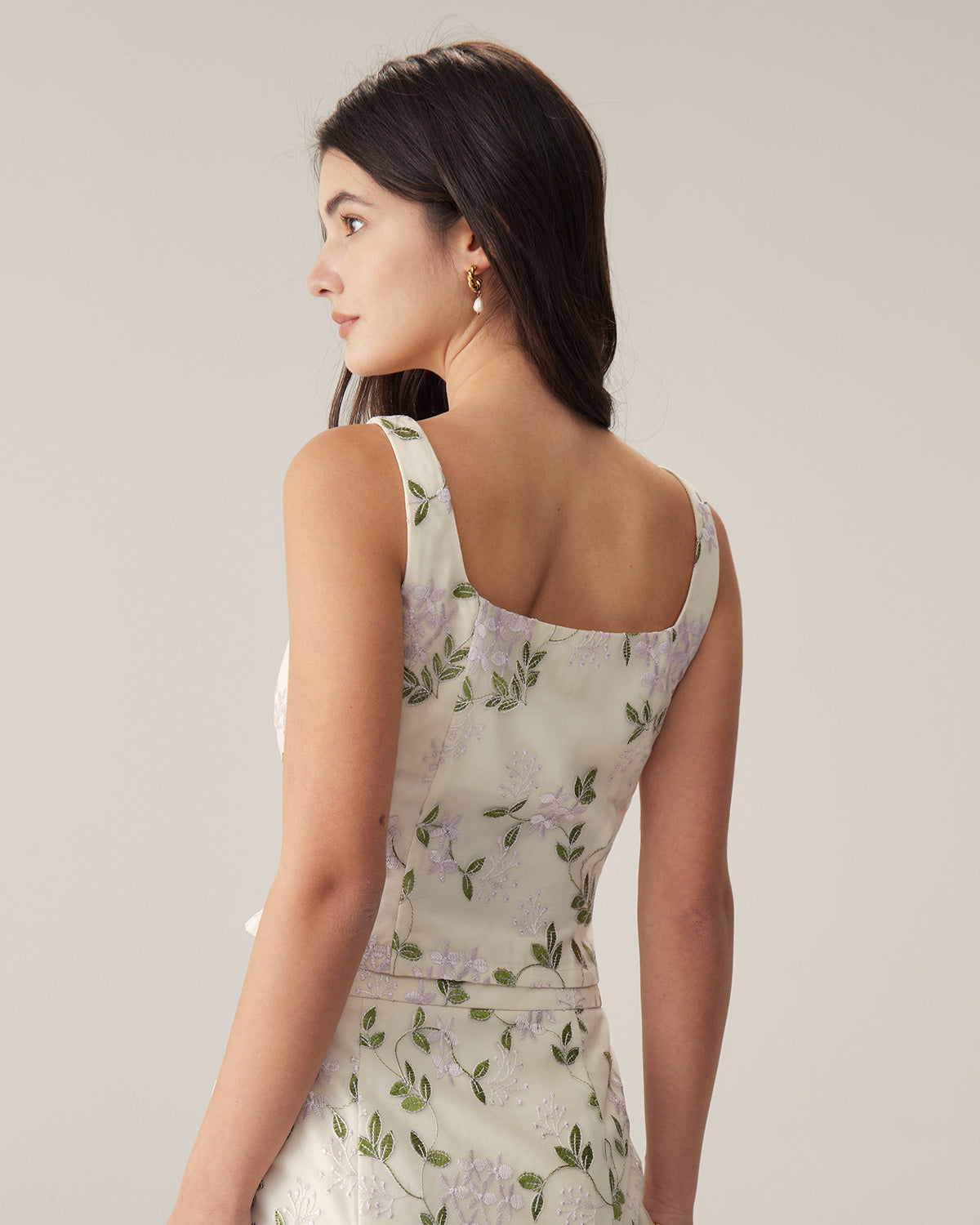 Top sin mangas ajustado floral beige