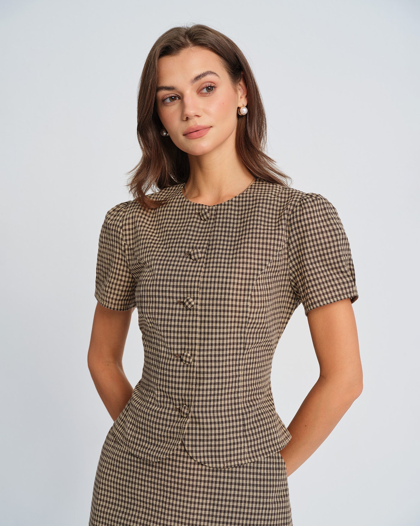 Blusa de manga abullonada a cuadros marrones