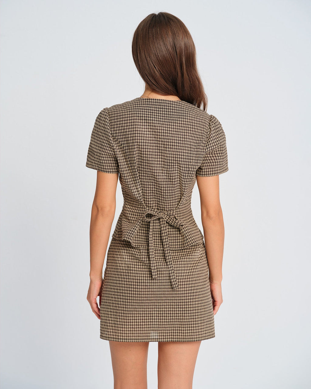 Blusa de manga abullonada a cuadros marrones