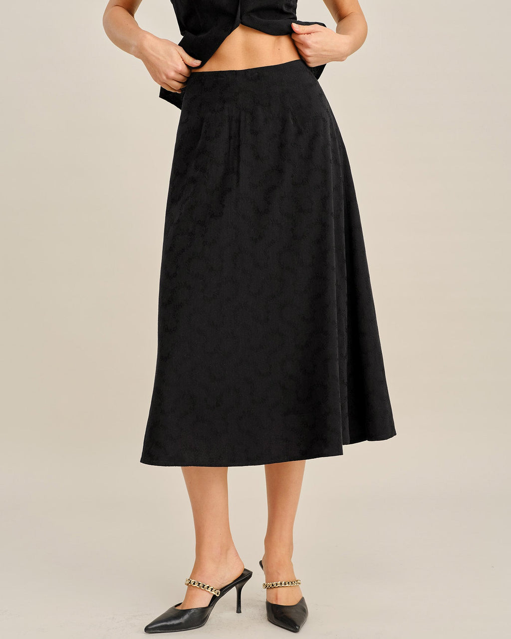 Falda midi negra bordada