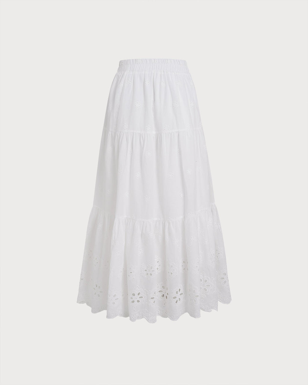 Falda midi blanca texturizada con diseño floral