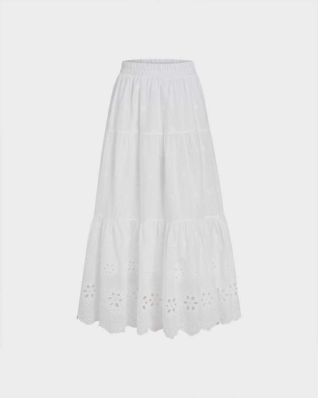 Falda midi blanca texturizada con diseño floral