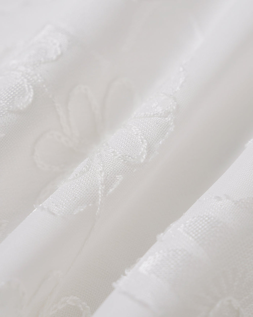 Pantalones Blancos Texturizados con Cintura Elástica y Estampado Floral