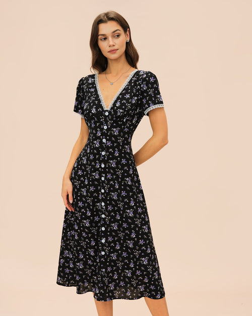 Vestido midi negro con cuello de pico, encaje y flores