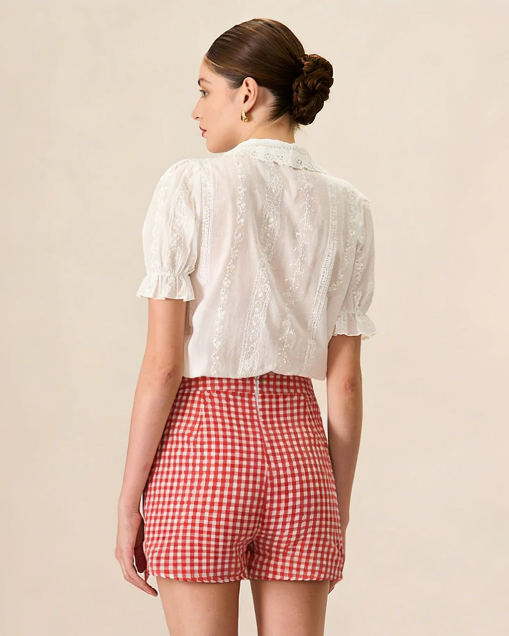 Minifalda-pantalón de cuadros rojos con botones