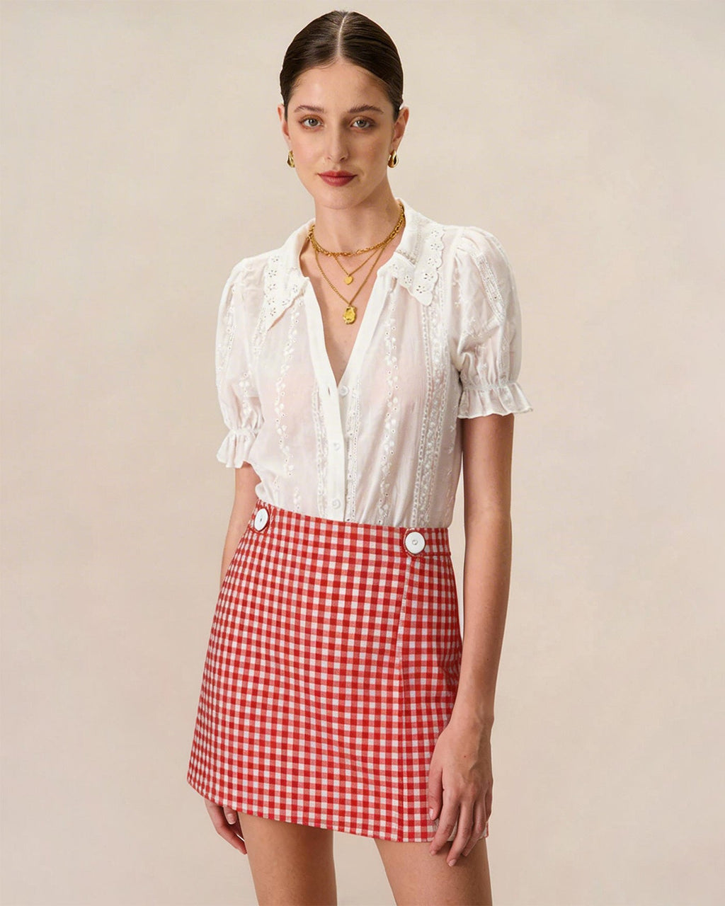 Minifalda-pantalón de cuadros rojos con botones
