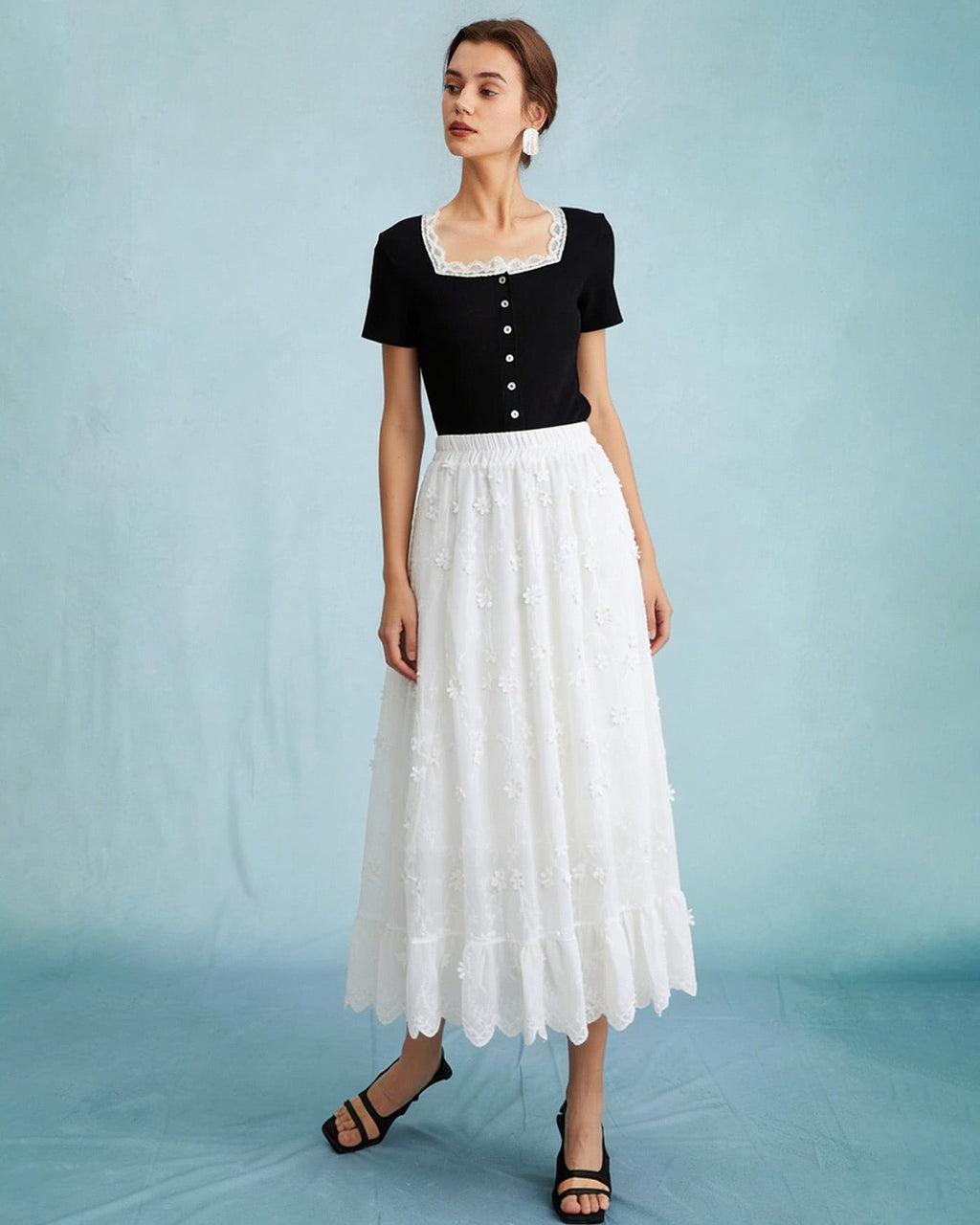 Falda midi elástica floral blanca con cintura elástica