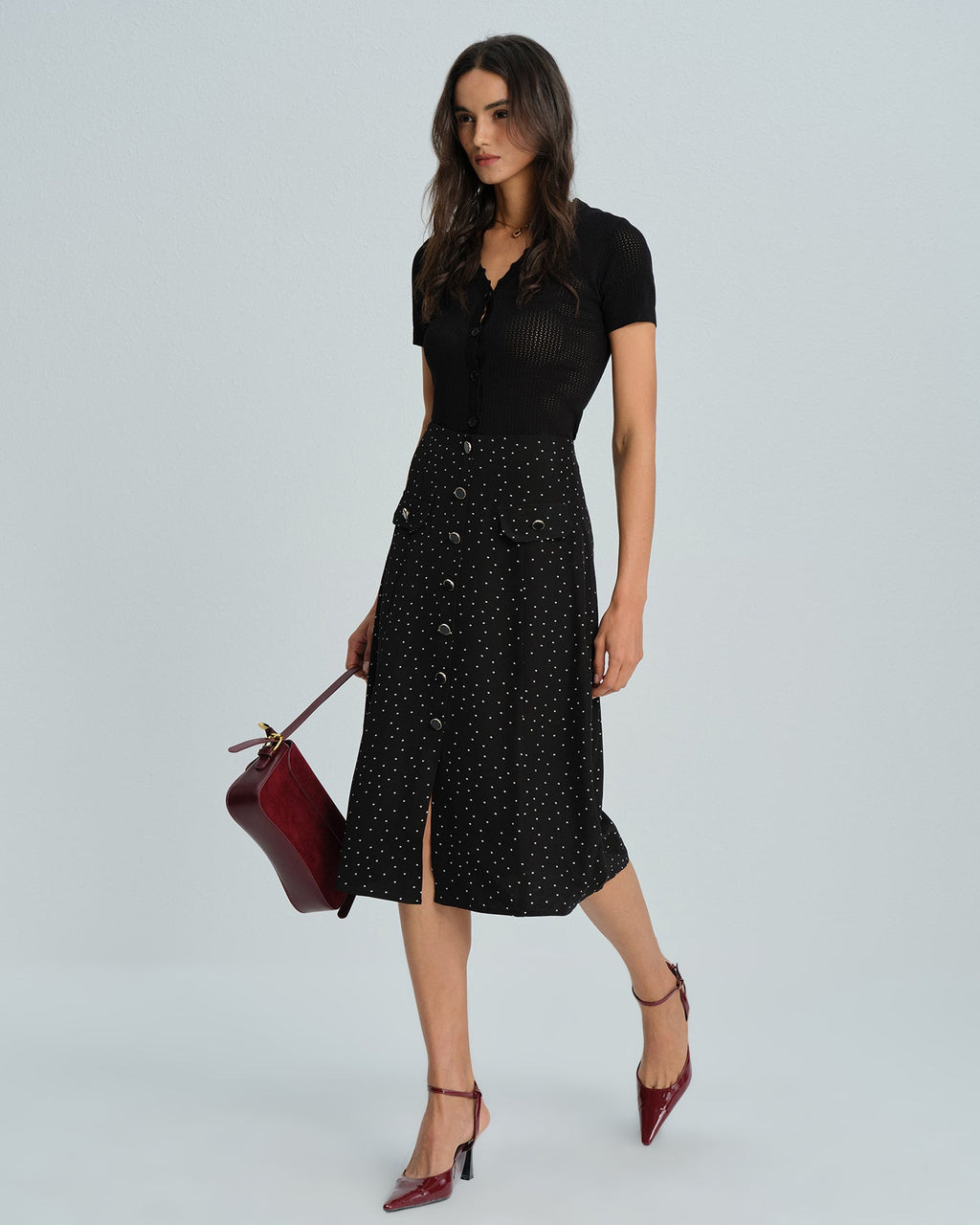 Falda midi negra de lunares