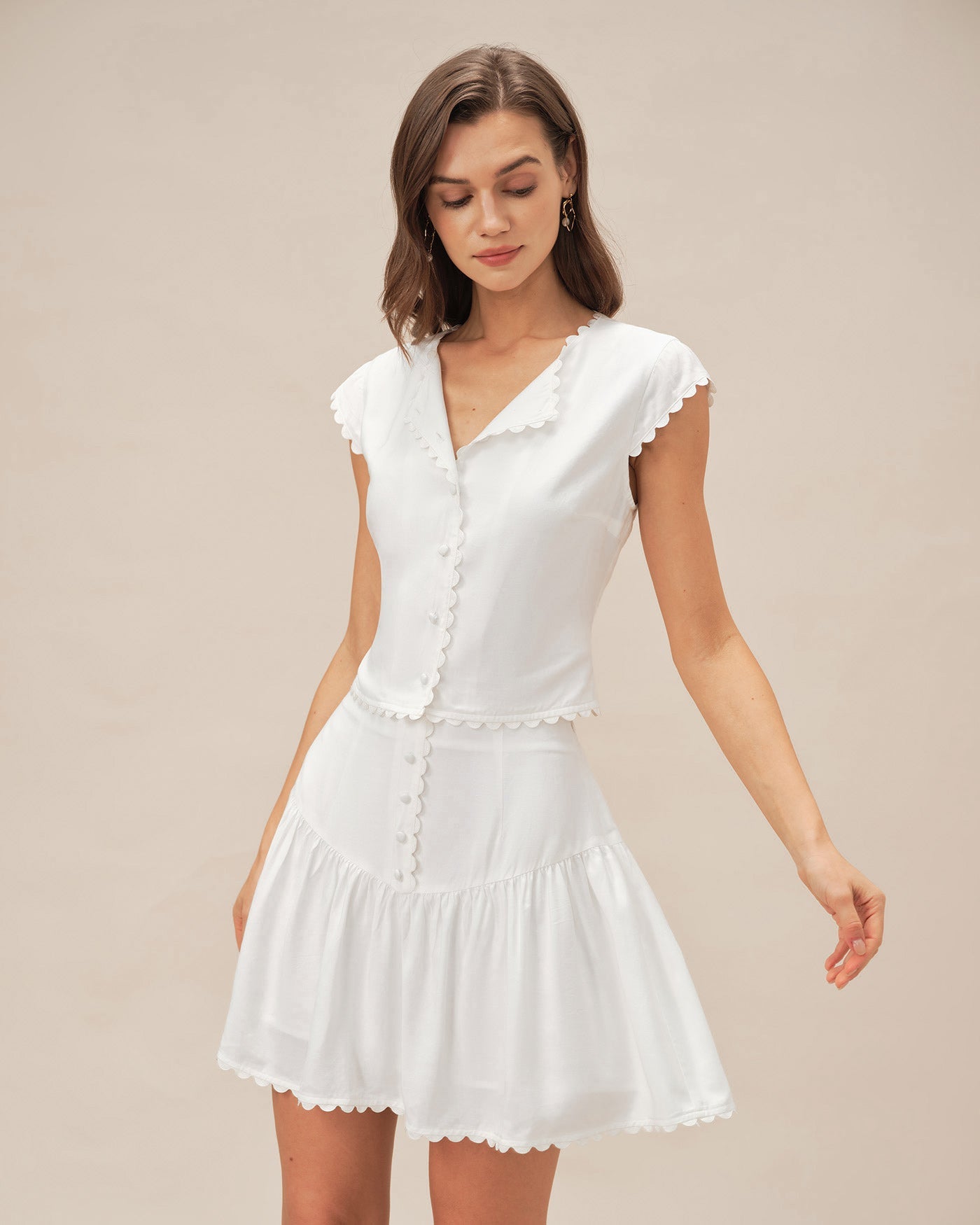 Minifalda fruncida con botones blanca