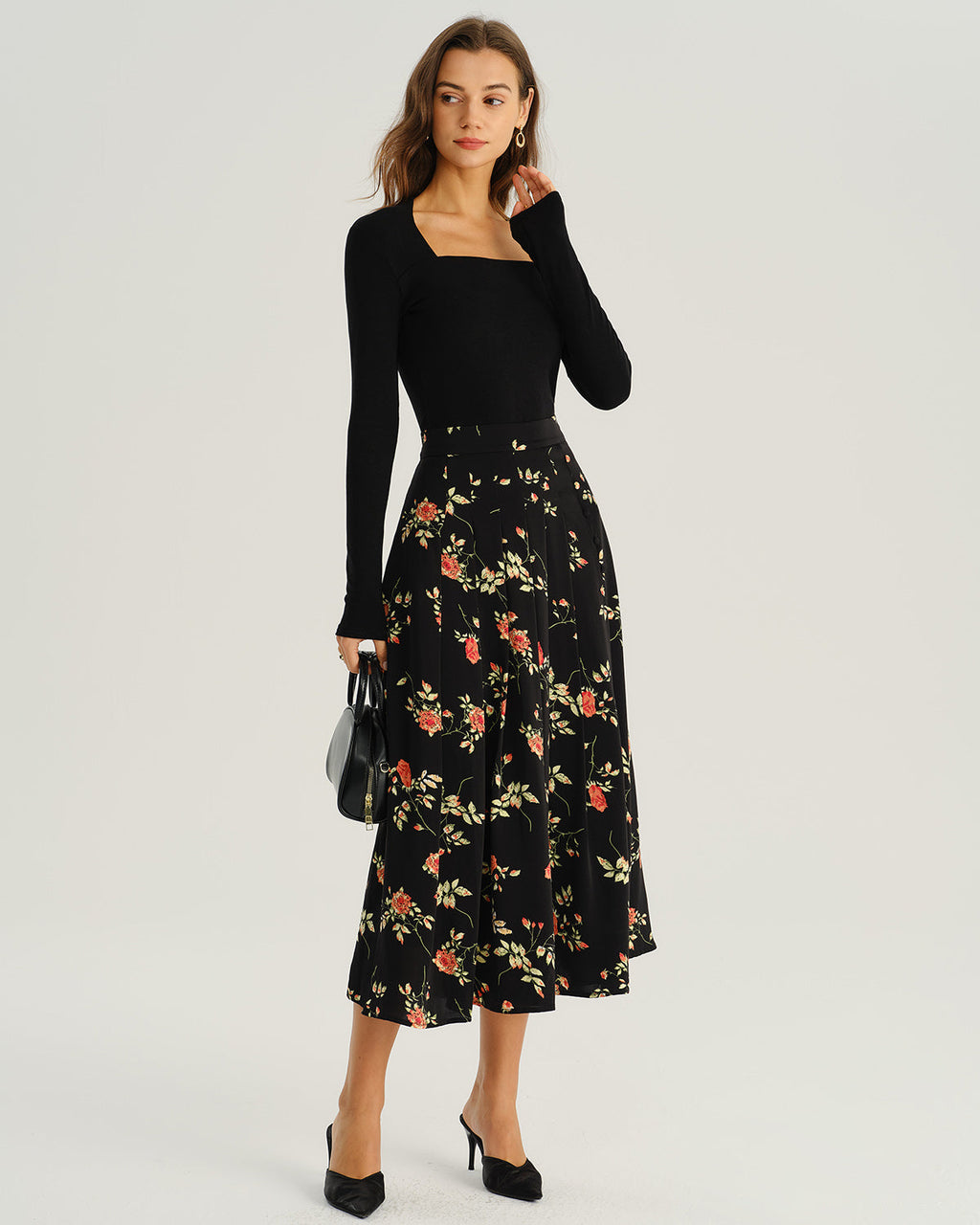 Falda midi de corte A negra con estampado floral