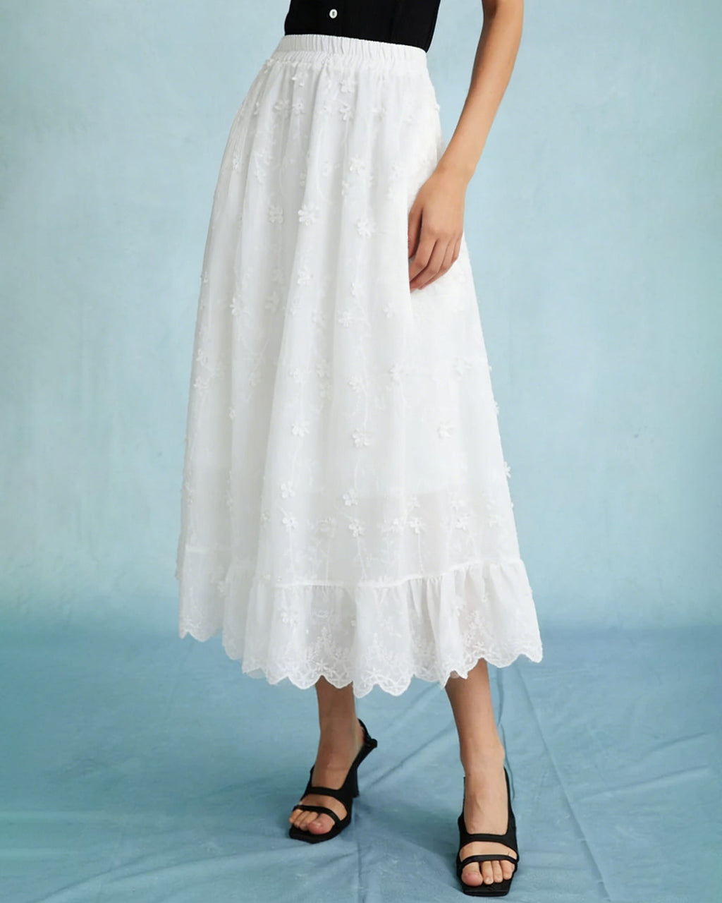 Falda midi elástica floral blanca con cintura elástica