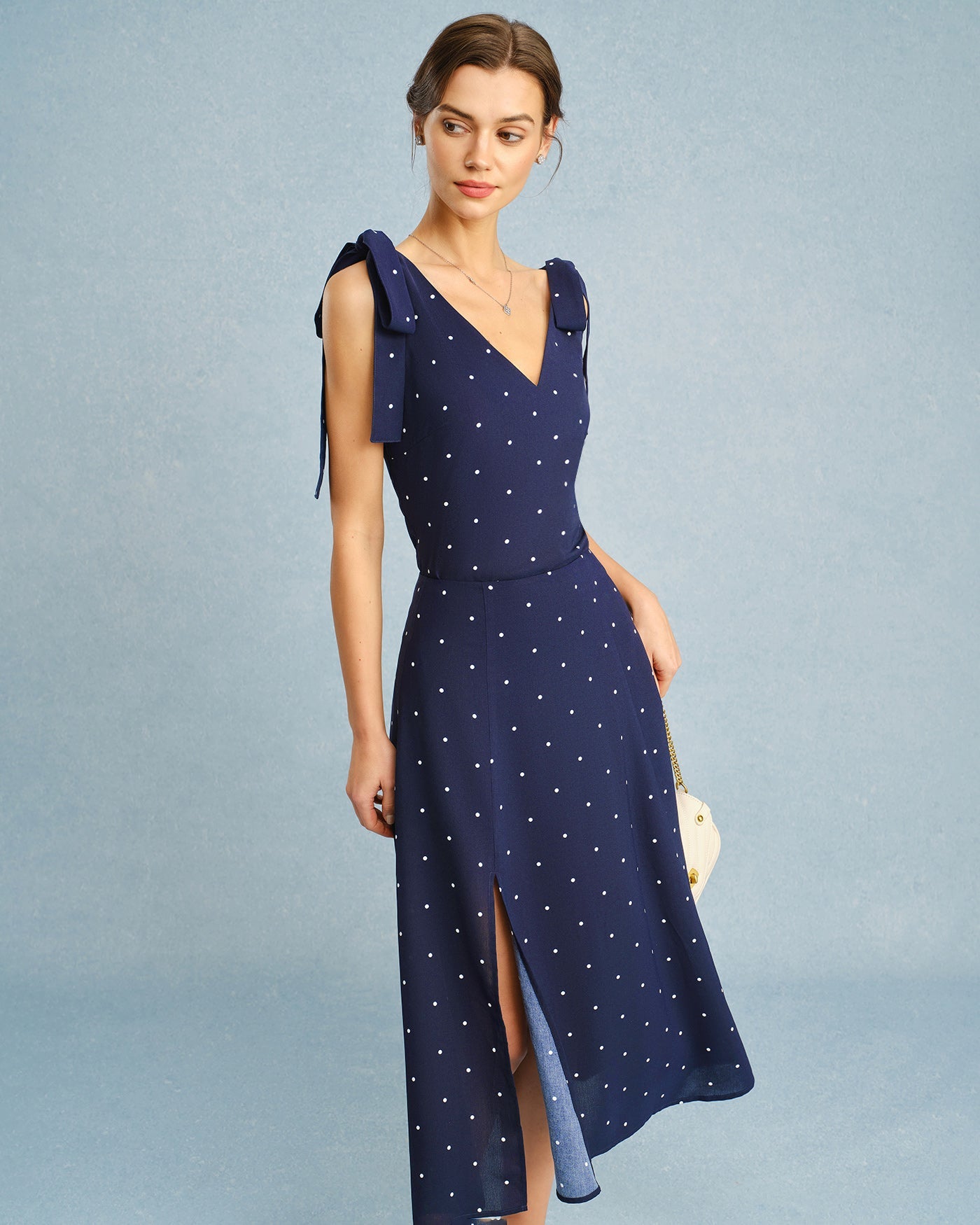 Falda midi con abertura de lunares azul marino