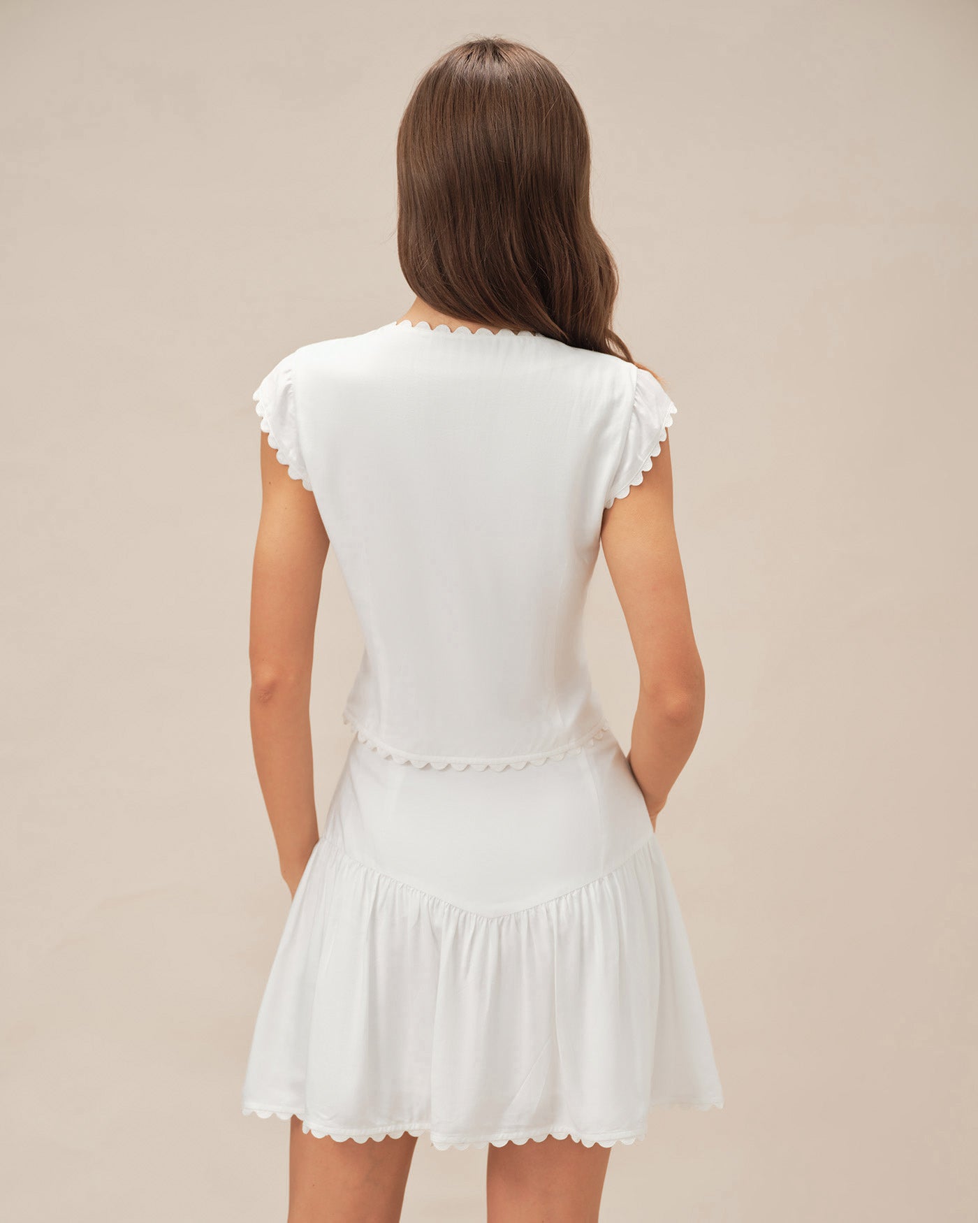 Minifalda fruncida con botones blanca