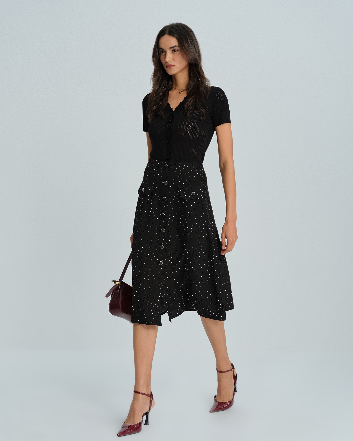 Falda midi negra de lunares