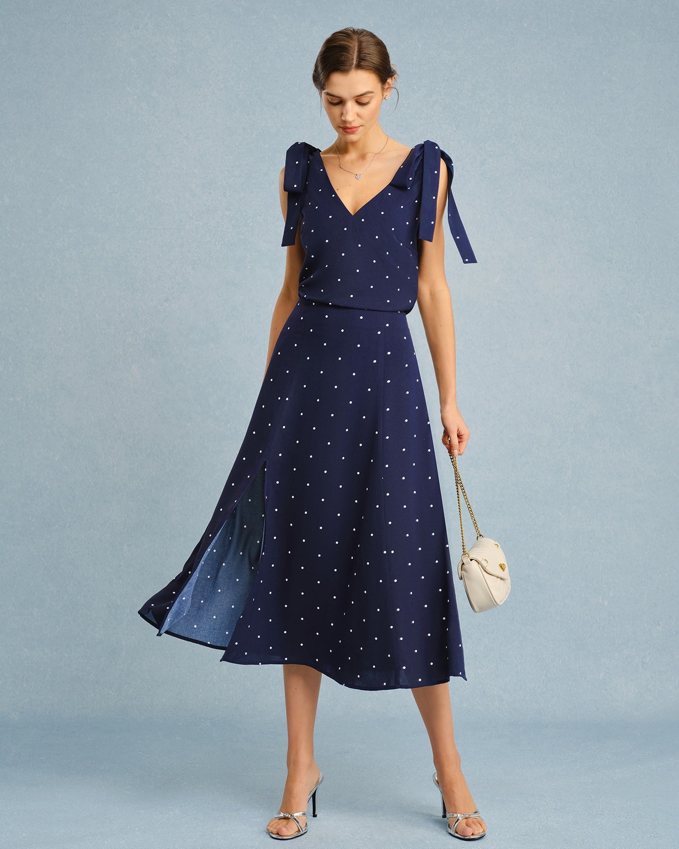 Falda midi con abertura de lunares azul marino
