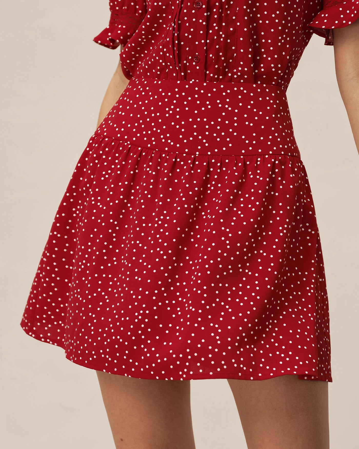 Minifalda drapeada roja de lunares