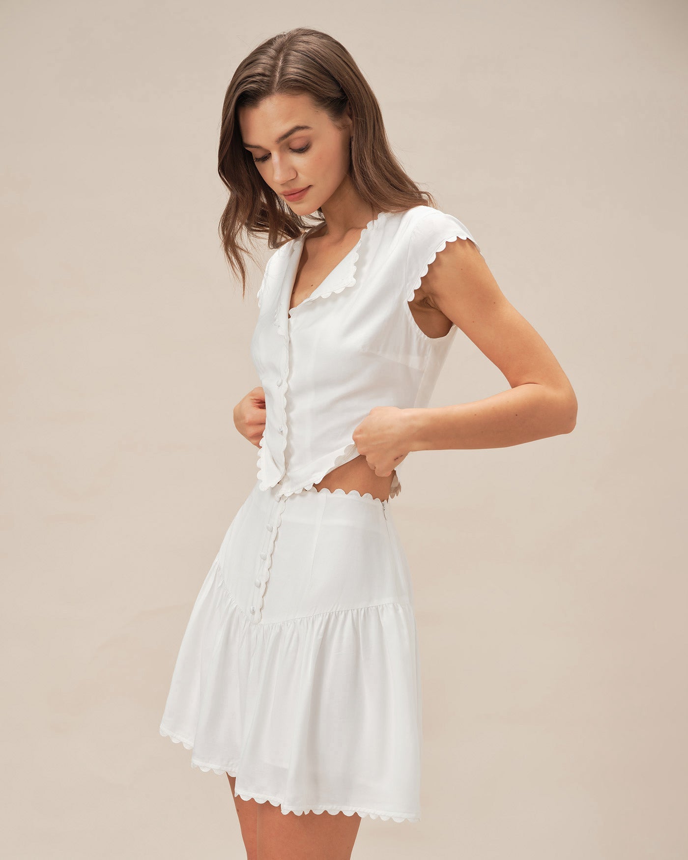 Minifalda fruncida con botones blanca