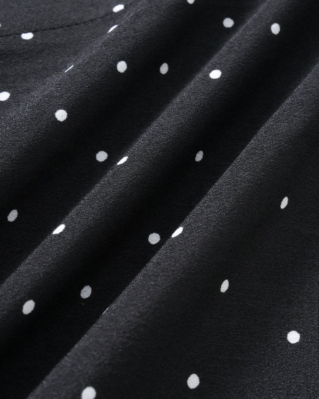 Falda midi negra de lunares