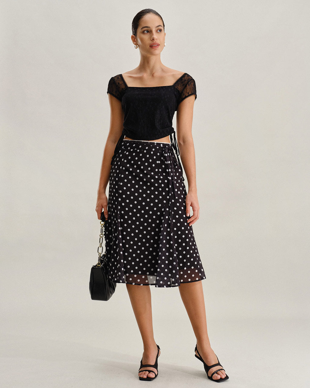 Falda midi de sirena negra con lunares