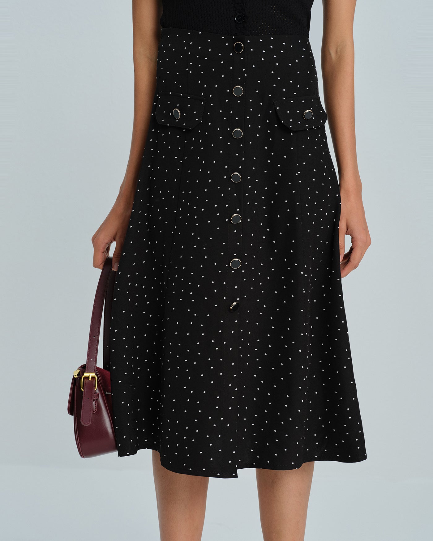 Falda midi negra de lunares