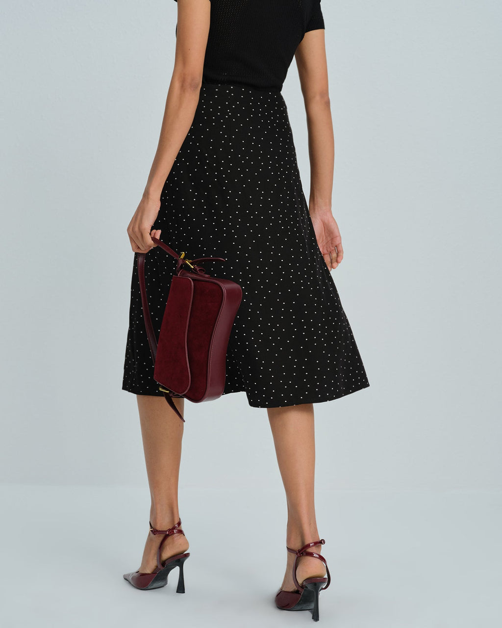 Falda midi negra de lunares