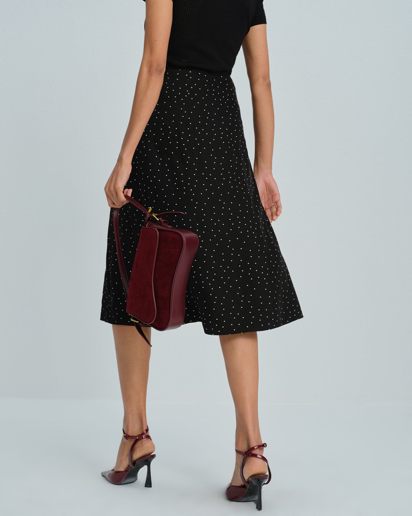 Falda midi negra de lunares