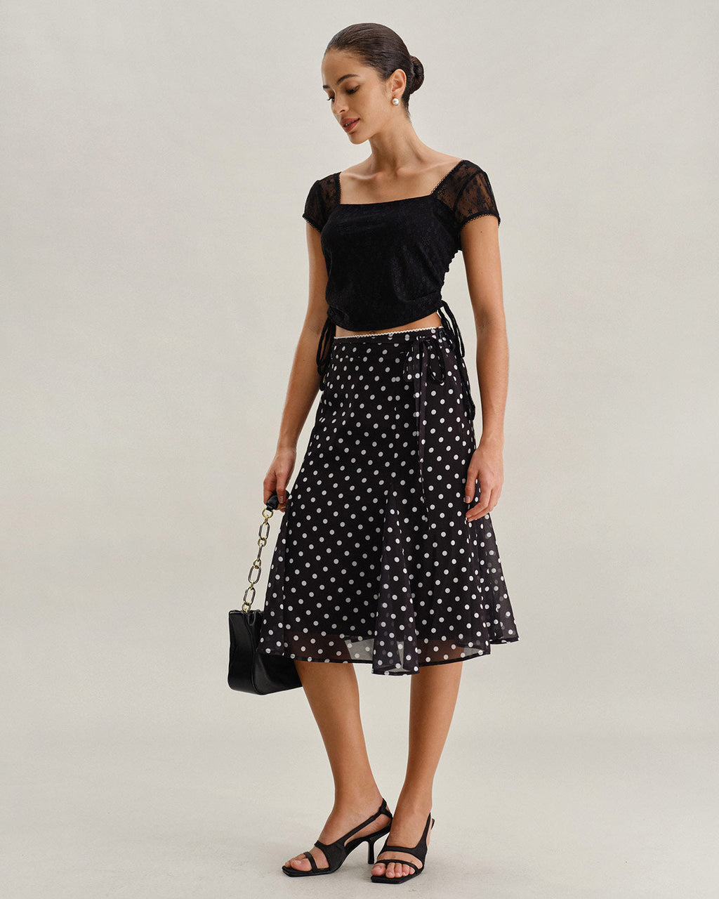 Falda midi de sirena negra con lunares