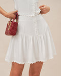 Minifalda fruncida con botones blanca
